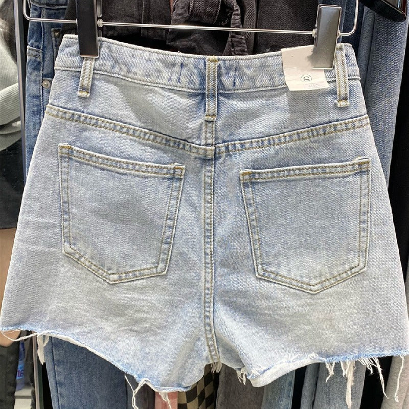 Women's fringed denim shorts
