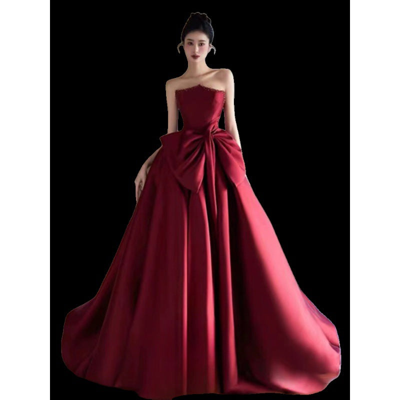 Evening dress in wine red strapless satin