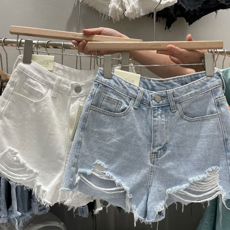 Women's fringed denim shorts