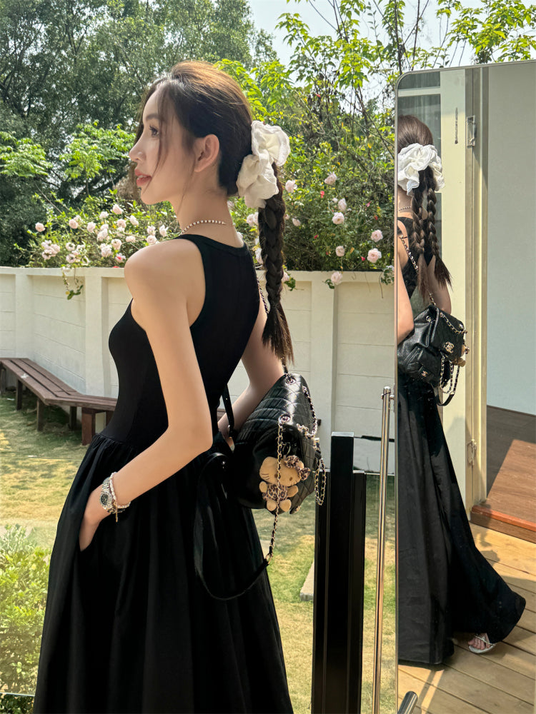 Black vest dress with floor-length skirt