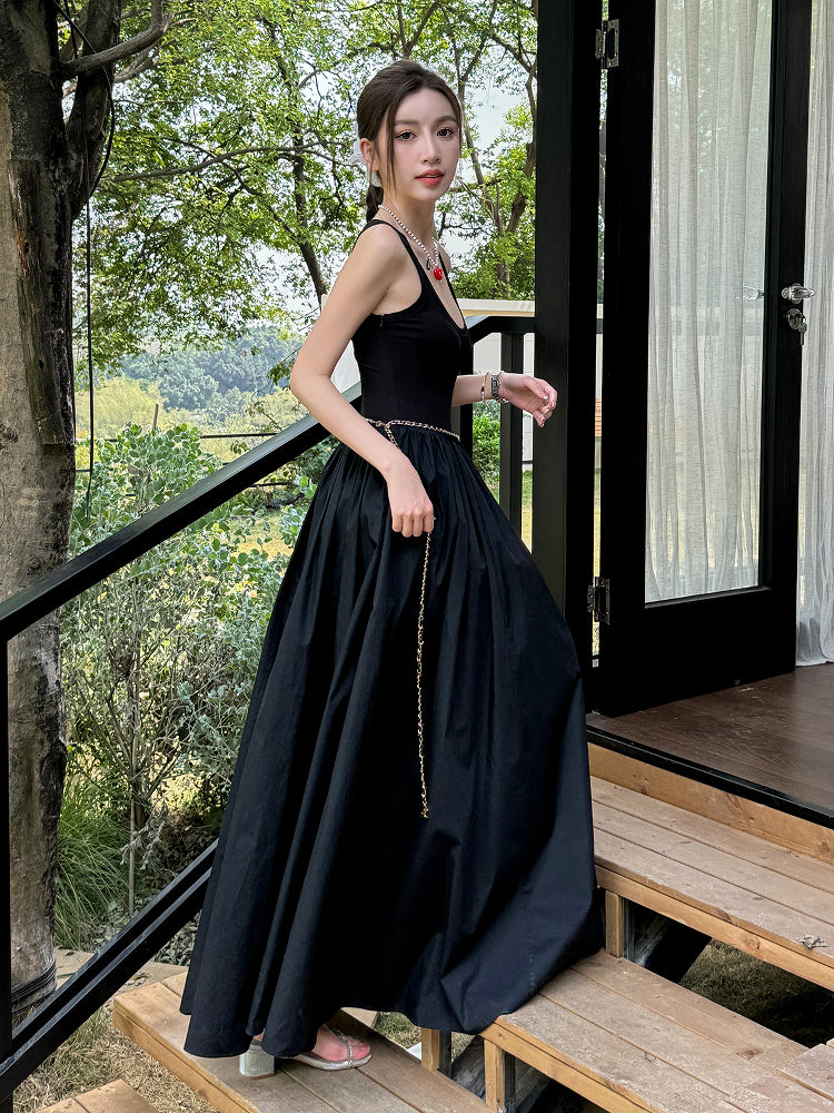 Black vest dress with floor-length skirt