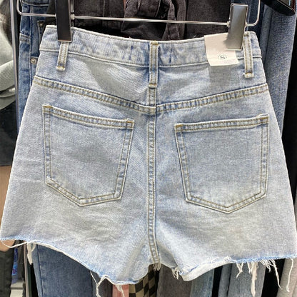 Women's fringed denim shorts