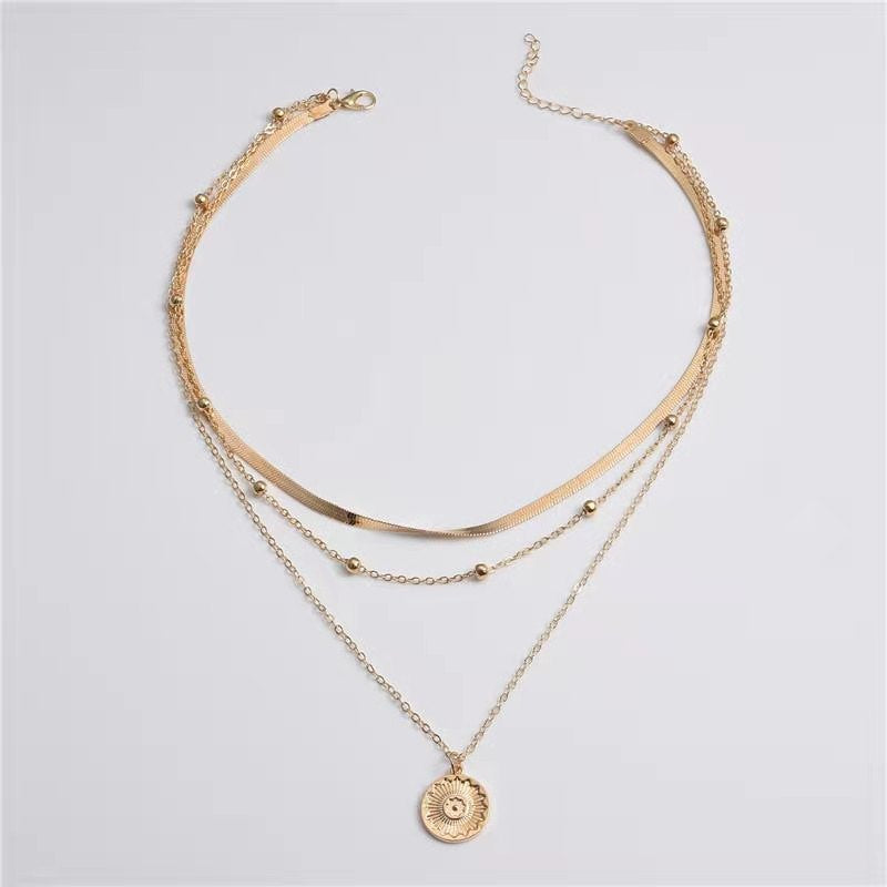 Layered Lotus Pendant Necklace with Geometric Blade Chain