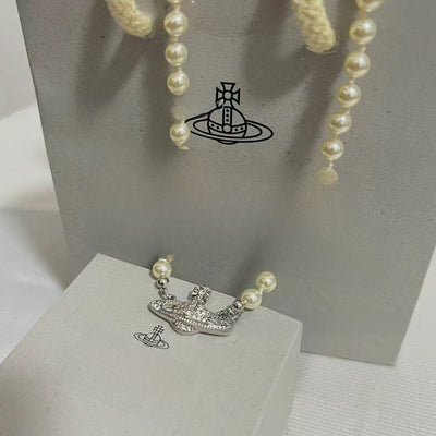 Saturn Pearl Necklace