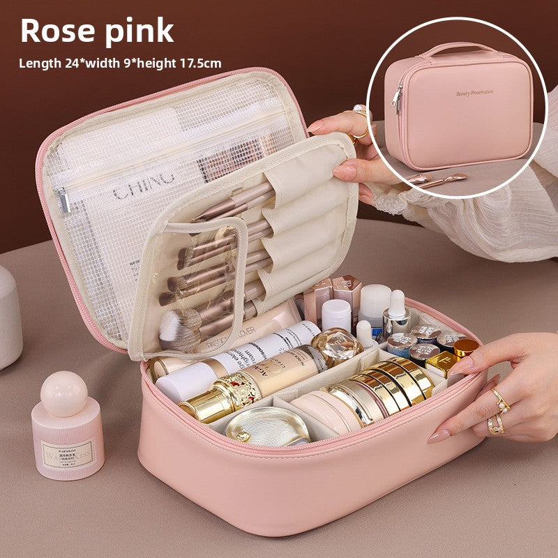 Portable hand-held zoned makeup bag