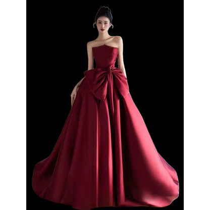 Evening dress in wine red strapless satin
