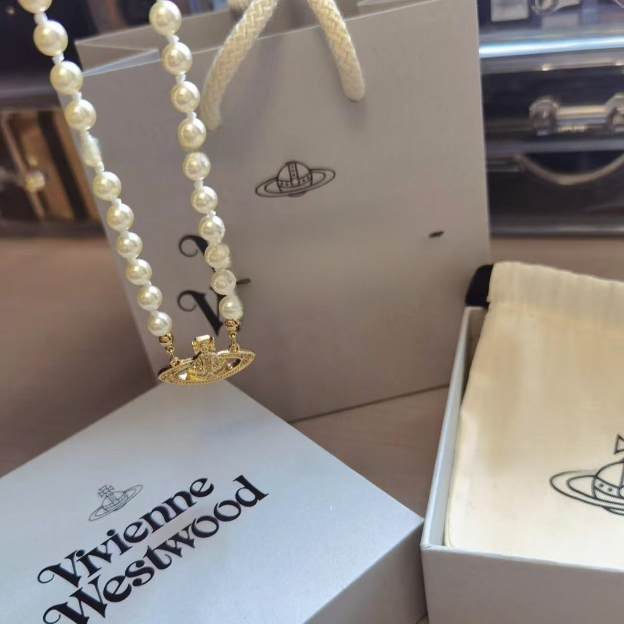 Saturn Pearl Necklace