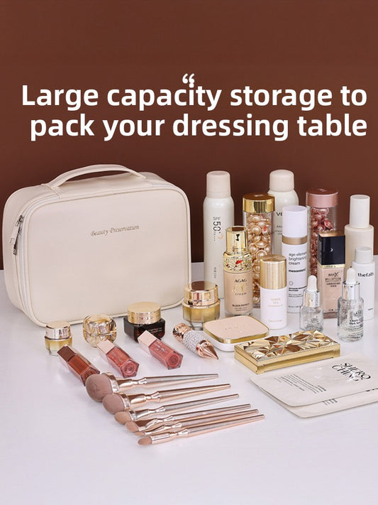 Portable hand-held zoned makeup bag