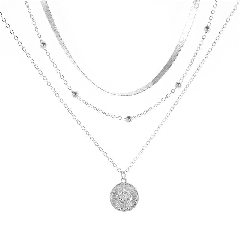 Layered Lotus Pendant Necklace with Geometric Blade Chain