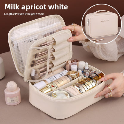Portable hand-held zoned makeup bag