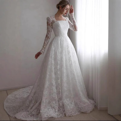 Embroidered Long Sleeve Trailing Wedding Dress by Glamytek
