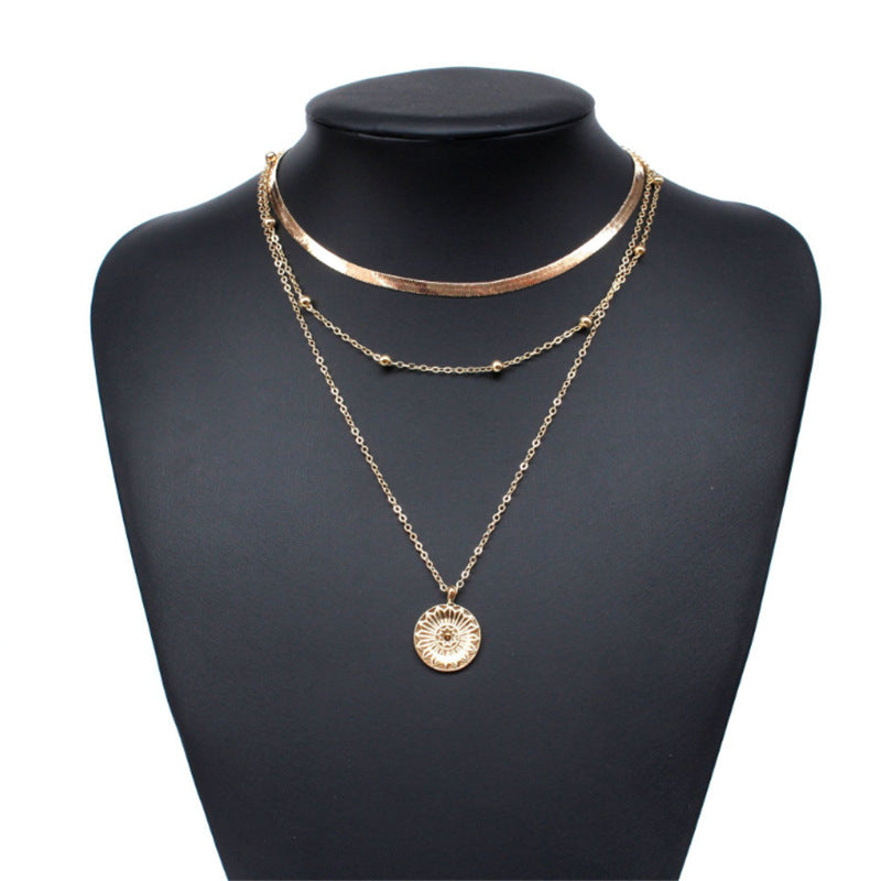 Layered Lotus Pendant Necklace with Geometric Blade Chain