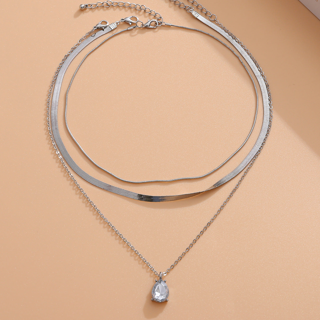 Layered Lotus Pendant Necklace with Geometric Blade Chain