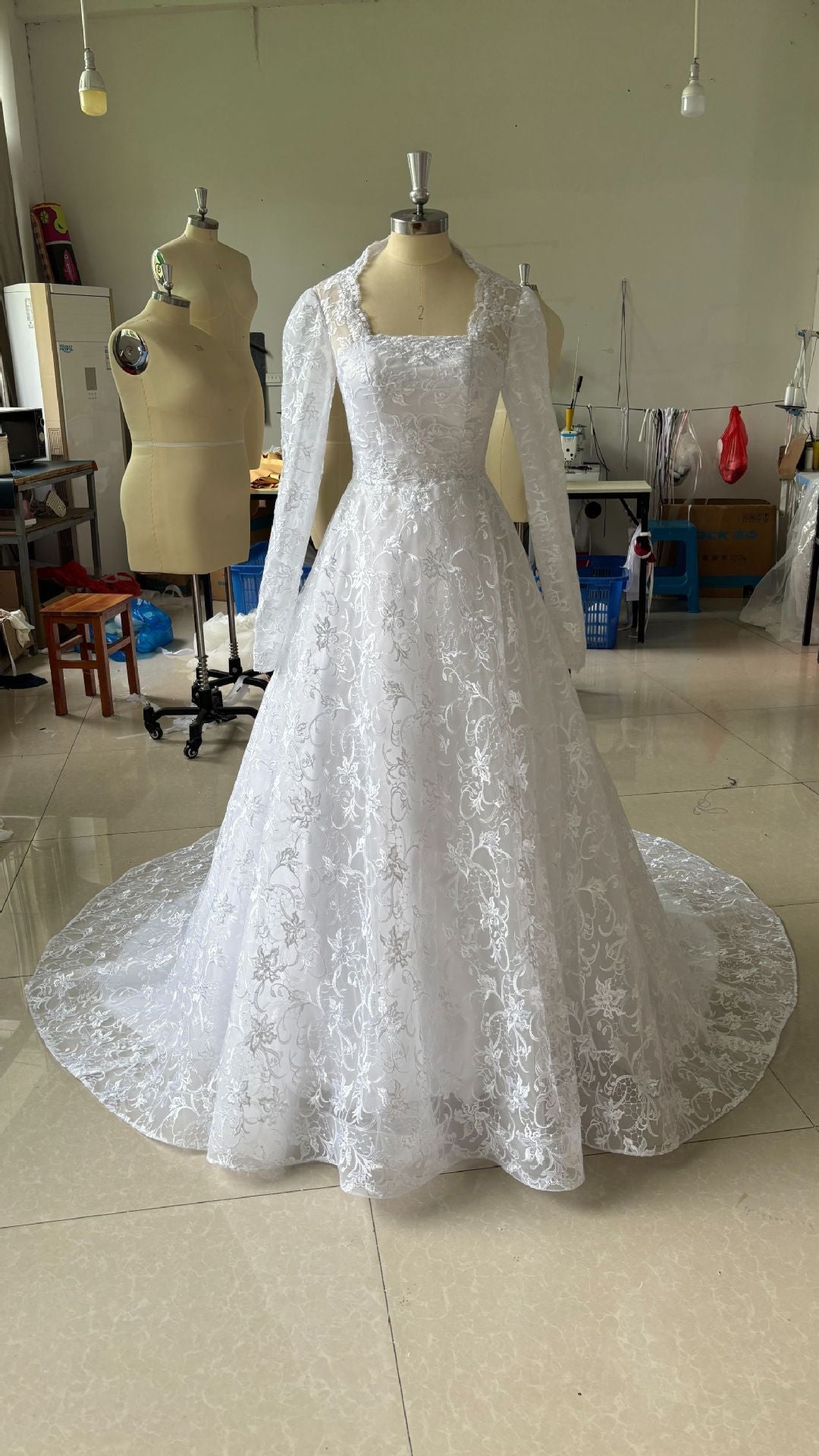 Embroidered Long Sleeve Trailing Wedding Dress by Glamytek
