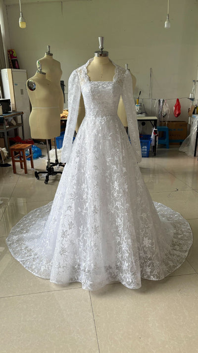 Embroidered Long Sleeve Trailing Wedding Dress by Glamytek