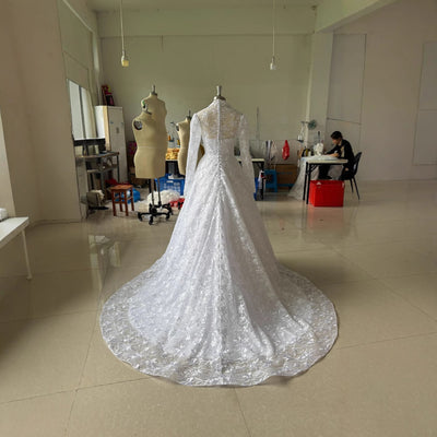 Embroidered Long Sleeve Trailing Wedding Dress by Glamytek