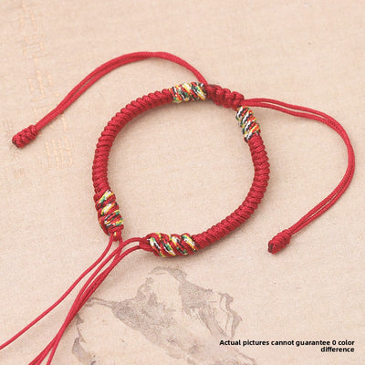 Gold wire diamond knot bracelet