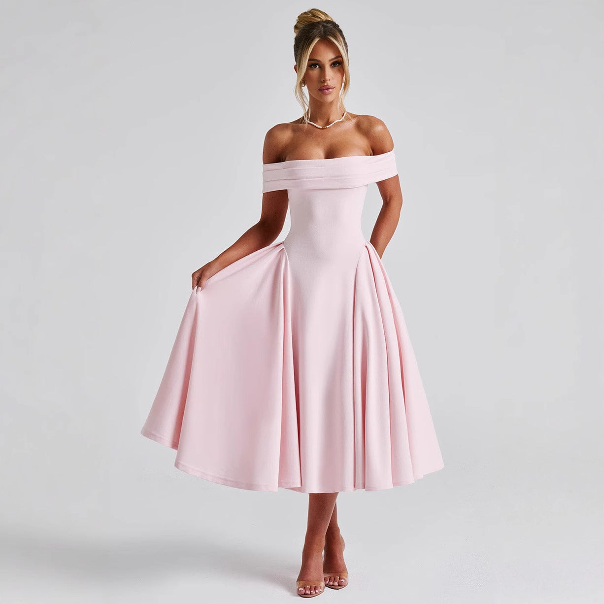 A one-neck backless solid-color strapless dress for women