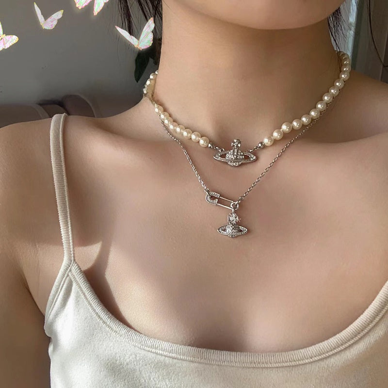 Saturn Pearl Necklace