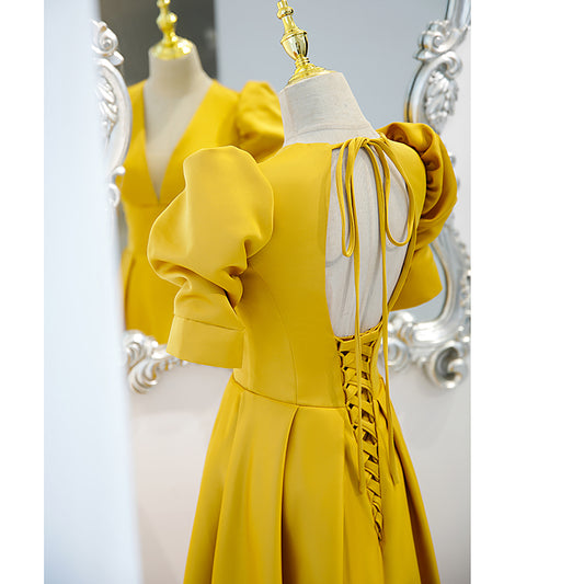 Golden evening dress for women