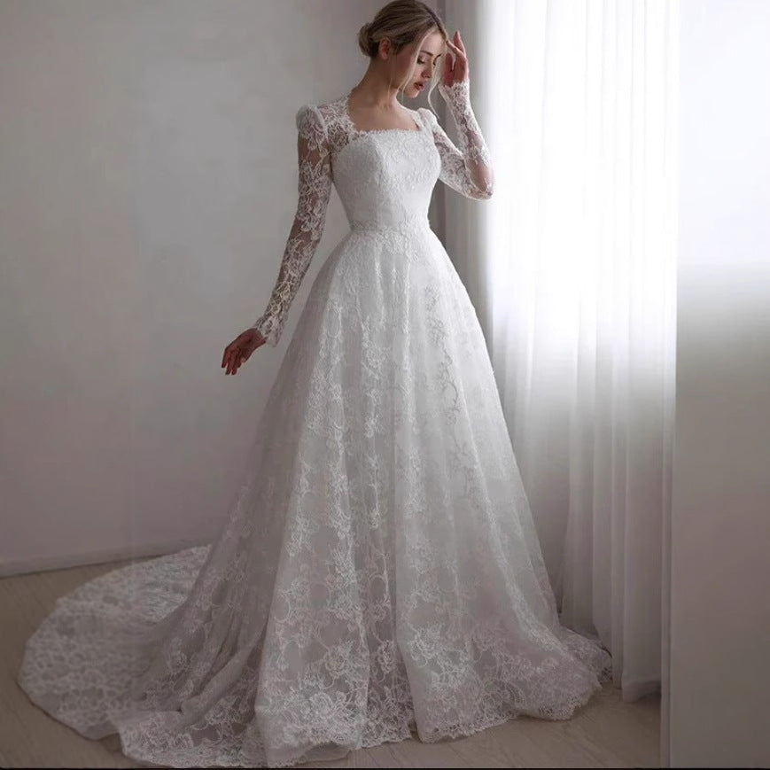 Embroidered Long Sleeve Trailing Wedding Dress by Glamytek