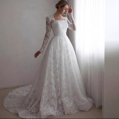 Embroidered Long Sleeve Trailing Wedding Dress by Glamytek