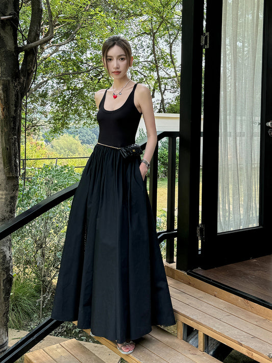 Black vest dress with floor-length skirt