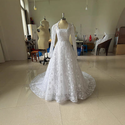 Embroidered Long Sleeve Trailing Wedding Dress by Glamytek